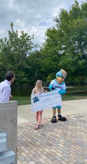 Freshman Exercise and Sports Science major Ava Rigney is awarded the final grand prize scholarship of free tuition, room and board, and meal plan for an entire semester, totaling $19,041. (Dr. Jim Solazzo pictured left, winner Ava Rigney in the middle)