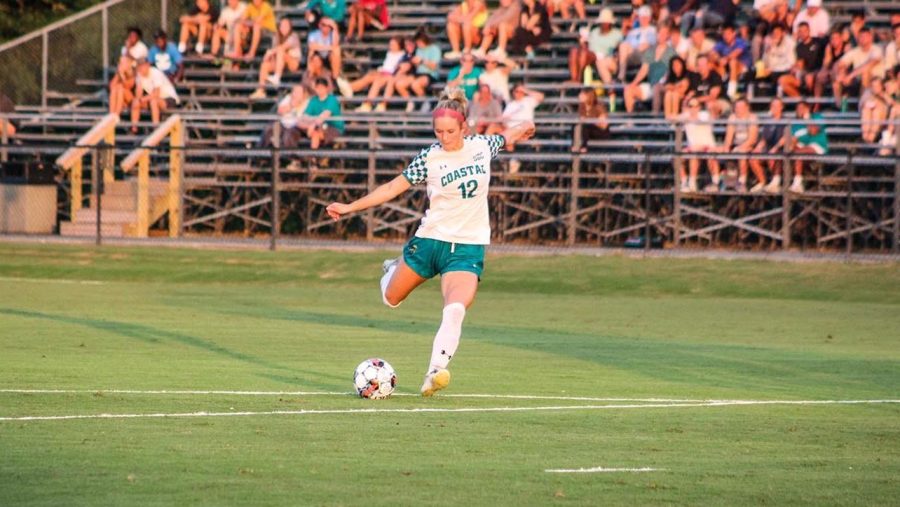Senior Megan Brouse takes a shot from outside the box early in Coastal’s matchup against Charleston Southern. 