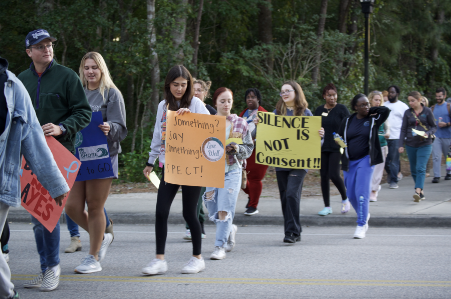 Students marching on campus.