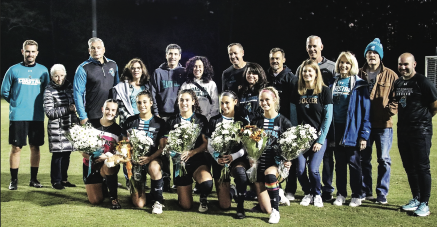 The Coastal Carolina women’s soccer team celebrates senior players before their matchup against Marshall University.