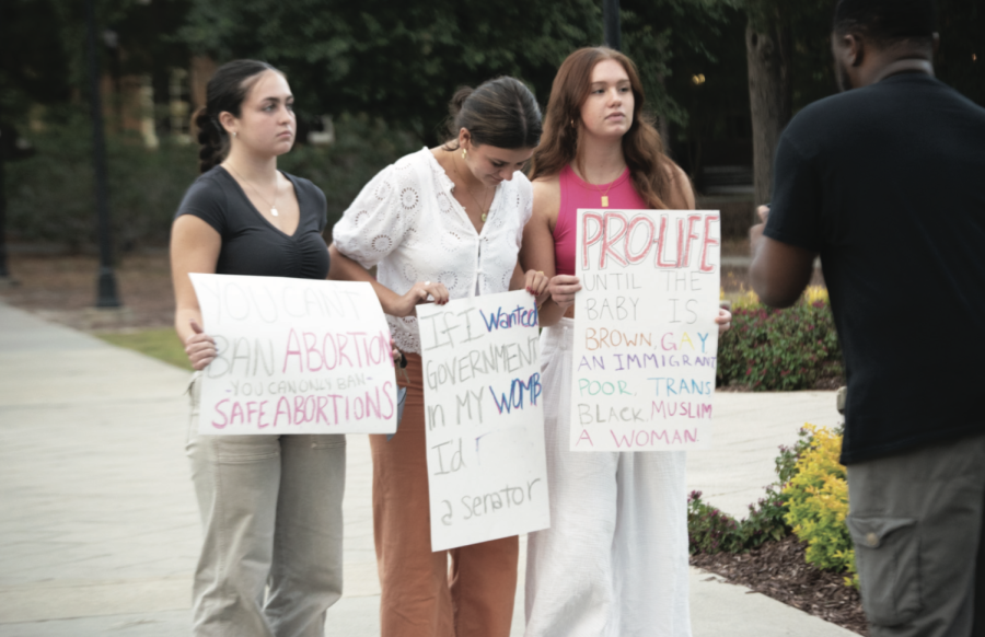 Three students attended the protest prior to the “My Body, No Choice” event on Prince Lawn.