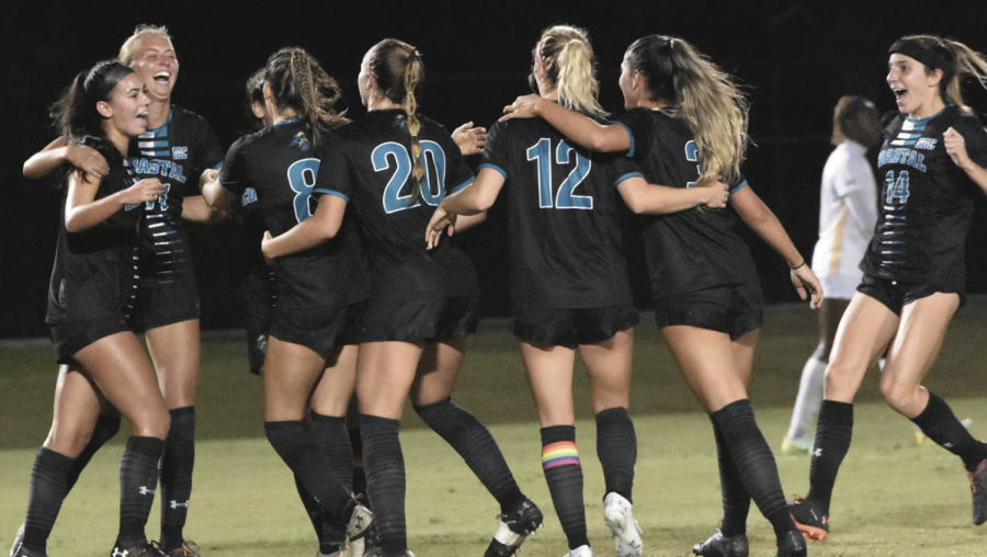 The women’s soccer team celebrates freshman Julia Ziegenfuss’s goal against ULM.