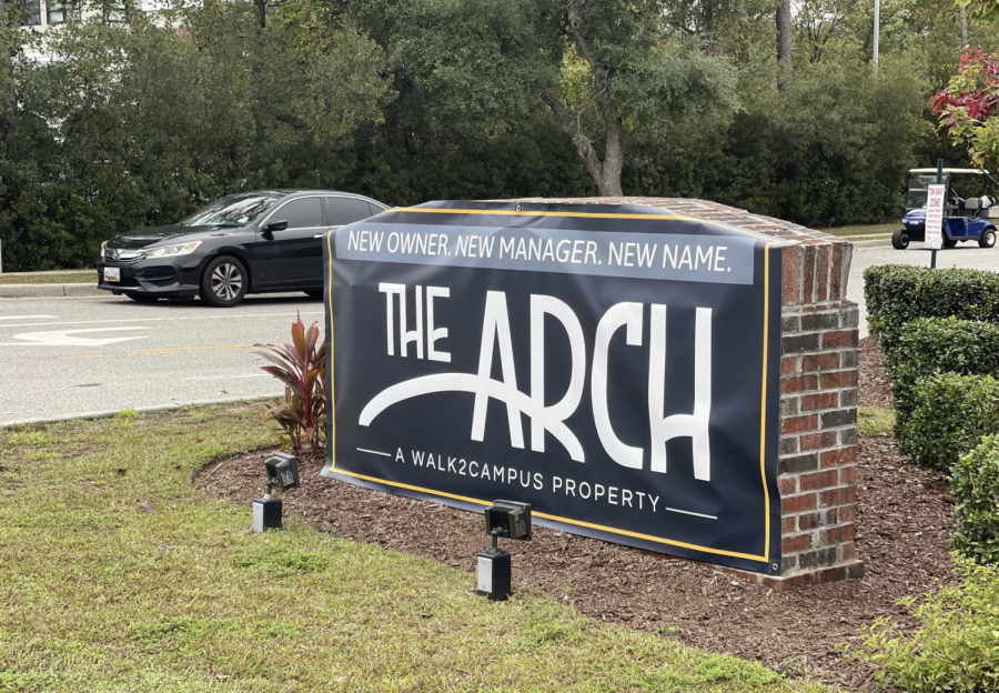 The Archs new banner covering the old Coastal Club Student Living sign.