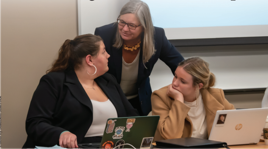 (Left to right) Gabrielle Ryder, new Student Government Association president; Claudia Bornholdt, co-adviser of SGA; Kenzie Skidmore, Chief of staff . SGA officers consult their adviser during their Jan. 30 meeting after a change in leadership. 