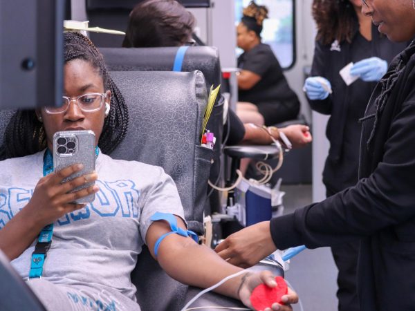 Student donates blood during the blood drive. 