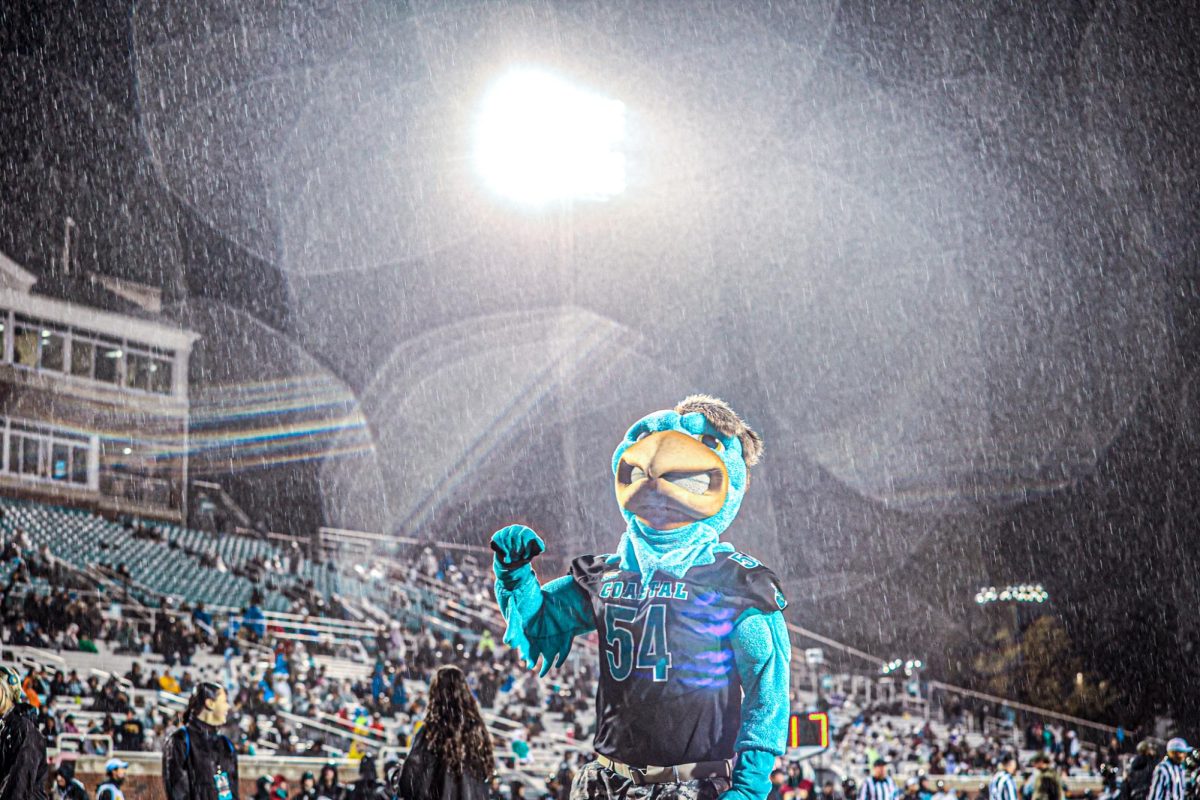 Chauncey weathers the storm during a home football game during the 2023 season.