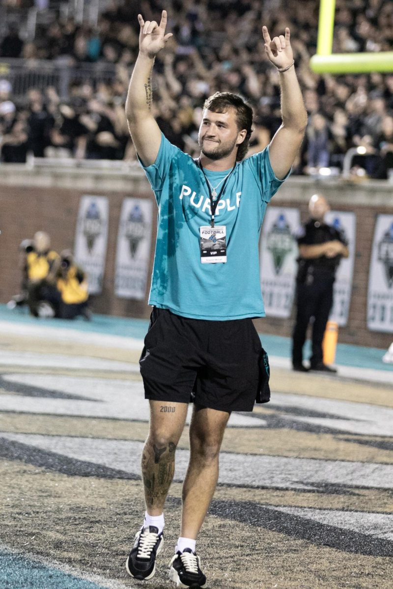 Grayson McCall, former quarterback, visits Coastal Carolina after retirement. 