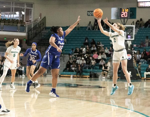 Savannah Brooks, guard, makes a shot from the 3-point line.