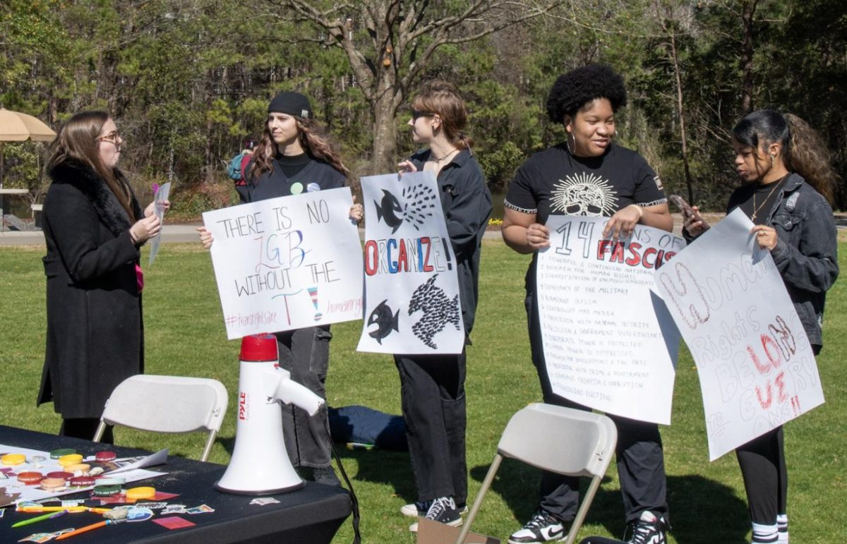 PPGA and Social Justice Club members hold a "Funeral for Democracy" protest on Prince Lawn Feb. 17.