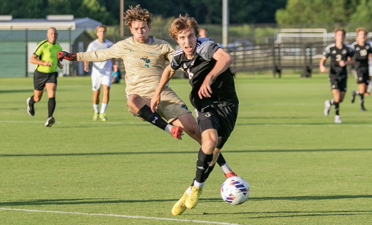 Goalkeeper Harrison Gough exits the goalkeeper box but loses possession to a Wofford Terrier resulting in a goal. 