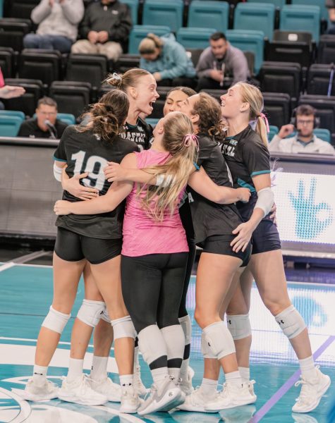 The Chanticleers celebrate their win over Old Dominion