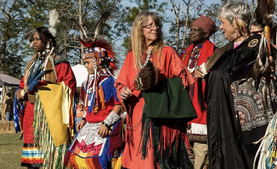 Waccamaw Indian tribe members line up in their regalia. Photo courtesy of the Waccamaw Indian People website