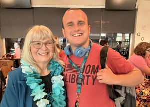 Previous CoastalLIFE Director Cheryl Morgan stands with sophomore Lawson Canon at her retirement party. Photo provided by Cheryl Morgan