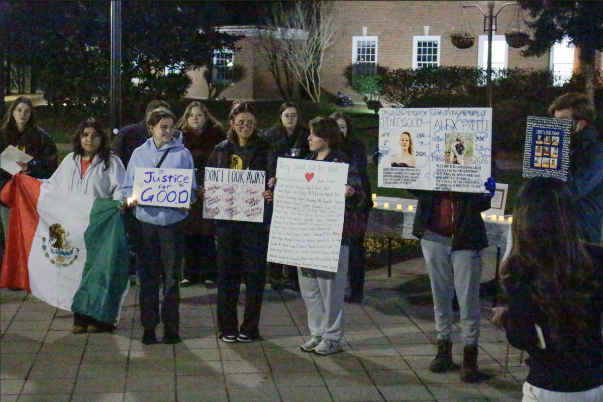 Students gather on Prince Lawn for a vigil honoring ICE victims.