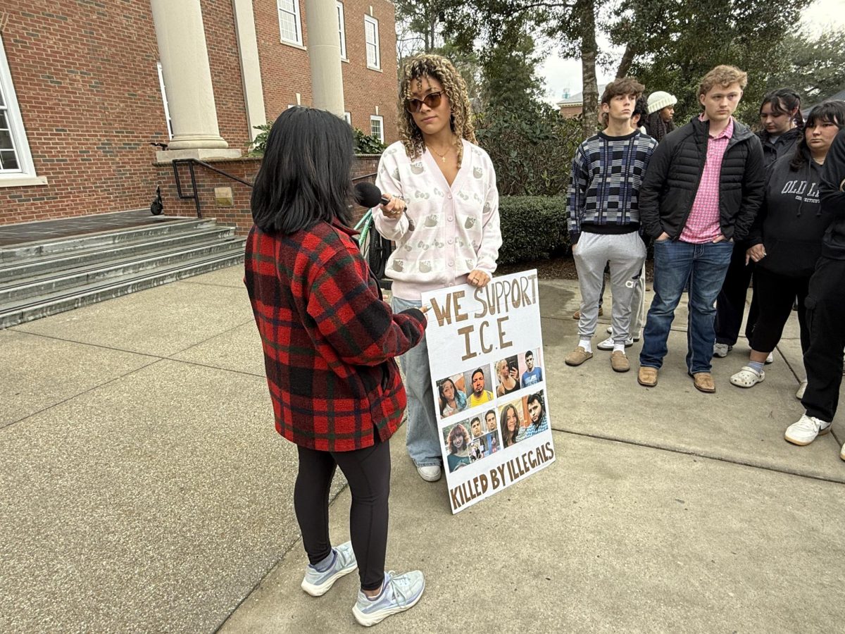 Student Jackie Freiberg, who was adopted from Guatemala, said coming to America is a privilege and one should be made to prove citizenship.