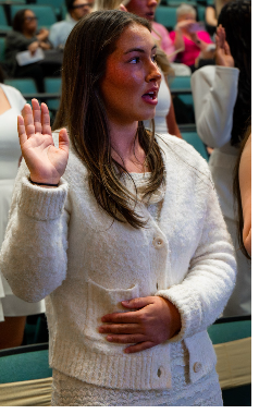 Student being inducted into Phi
Alpha Delta. Photo courtesy of DeQuan Mckever.